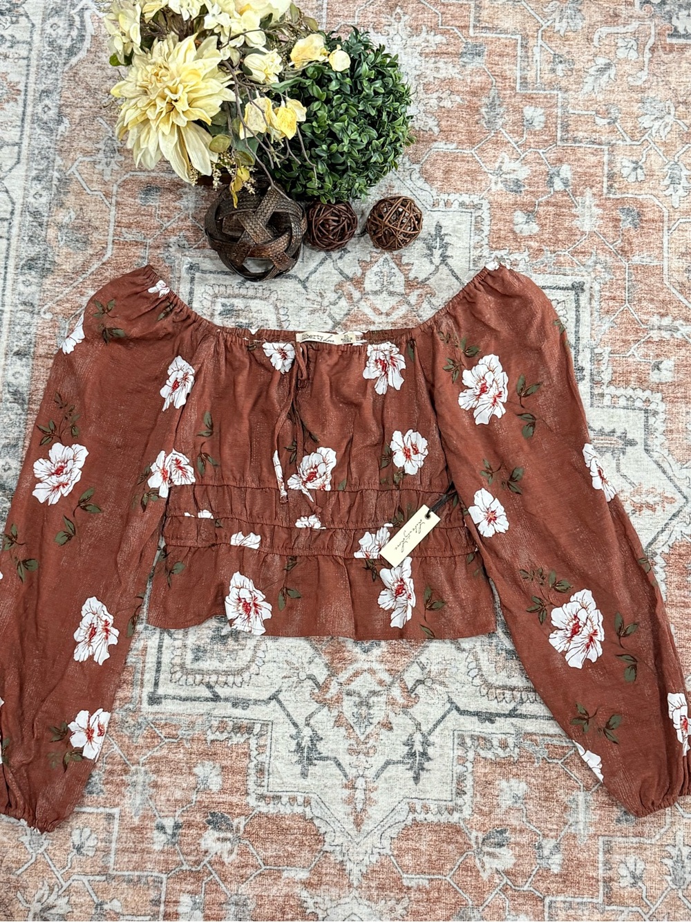 Women’s Floral Off-Shoulder Peplum Top in Rust